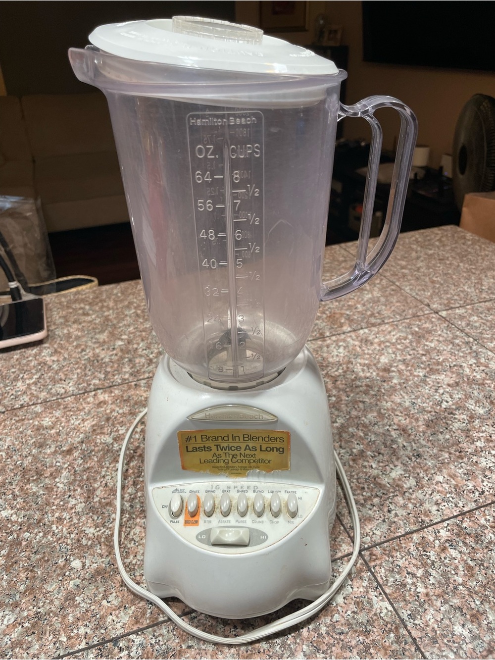 White Hamilton Beach 16-Speed Blender featuring a plastic pitcher and a row of p